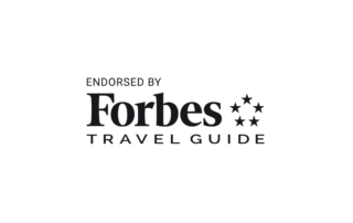 In Travel Solutions, Forbes Logo